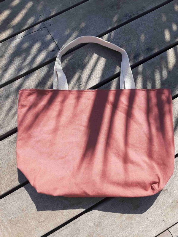 Sac cabas en tissu terracotta, avec anses en coton.